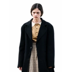 Mackenzie Foy The Isolate Thief 2026 Black Coat
