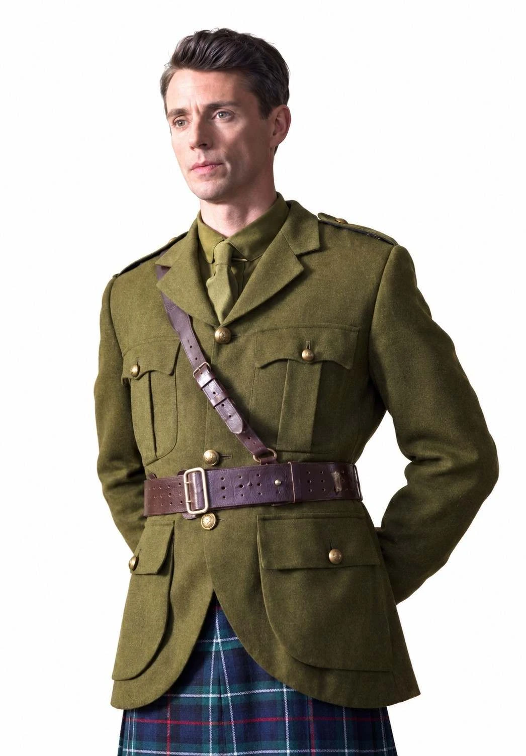 Matthew Goode Fortitude 2026 Olive Green Military Jacket Matthew Goode wearing Fortitude 2026 olive green military jacket with leather belt
