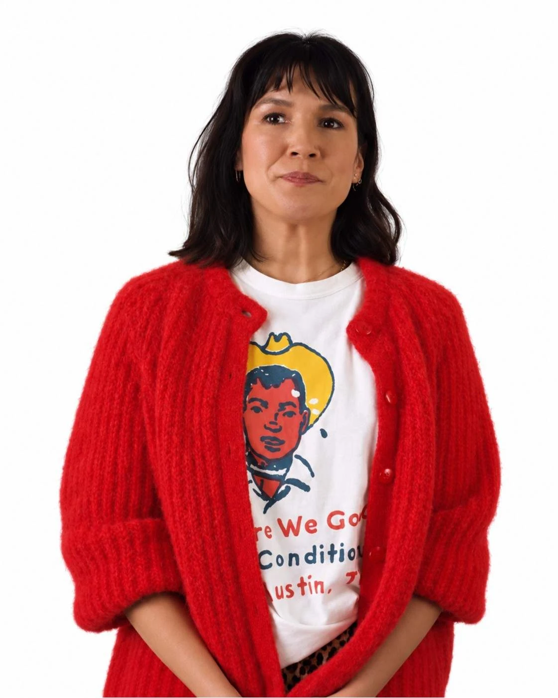 Zoë Chao Let’s Have Kids Red Knit Cardigan Zoë Chao wearing red fuzzy knit cardigan with puff sleeves in Let’s Have Kids