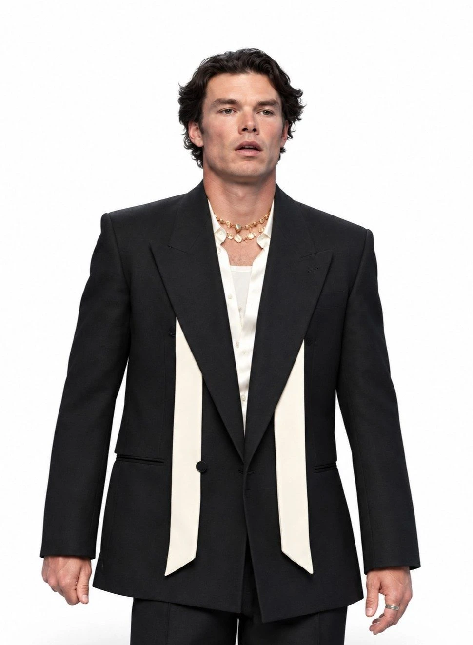 Sam Corlett Black Suit Jacket – The Land (2026) Sam Corlett wearing a black suit jacket with ivory front panels