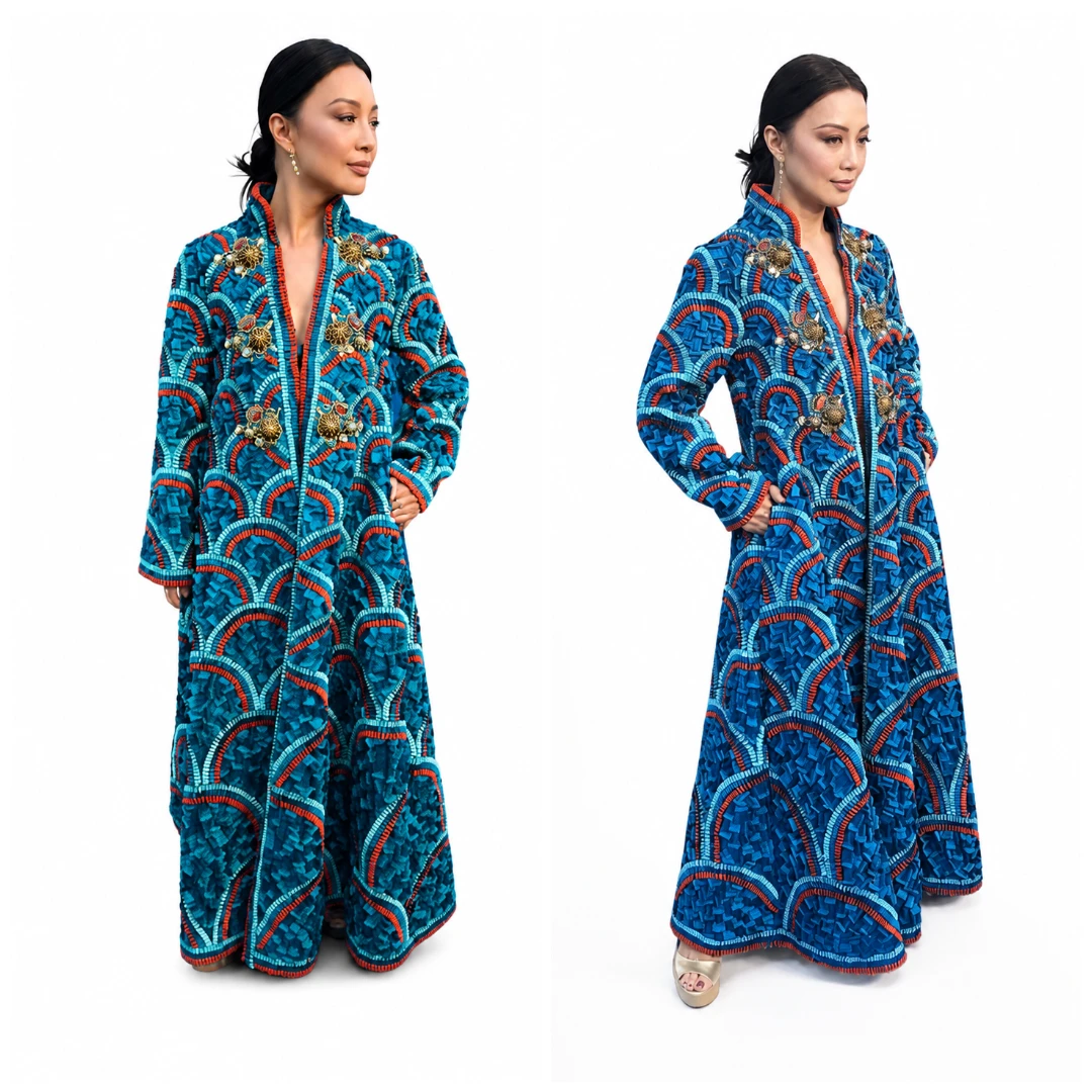 Ming-Na Wen wearing a blue printed long coat in Moana 2026
