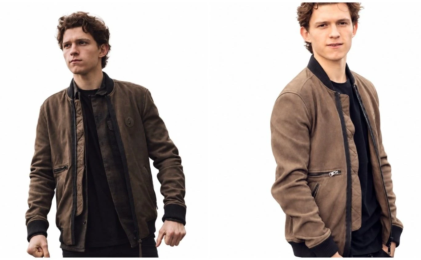Tom Holland wearing a brown velvet bomber jacket